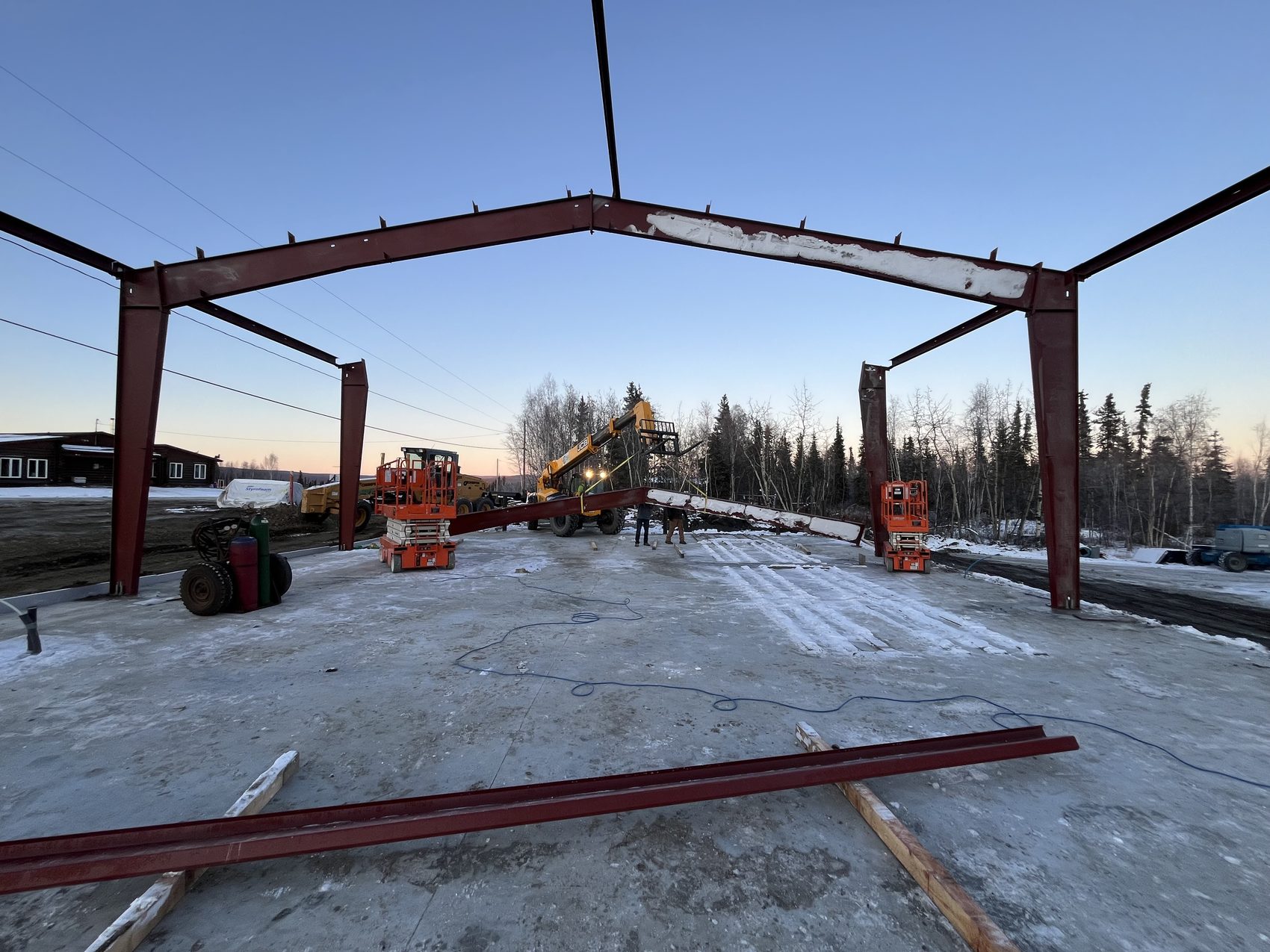 Steel-frame building under construction on an Alaska jobsite