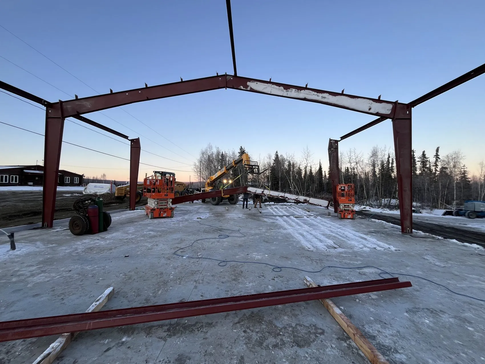 Steel-frame building under construction on an Alaska jobsite